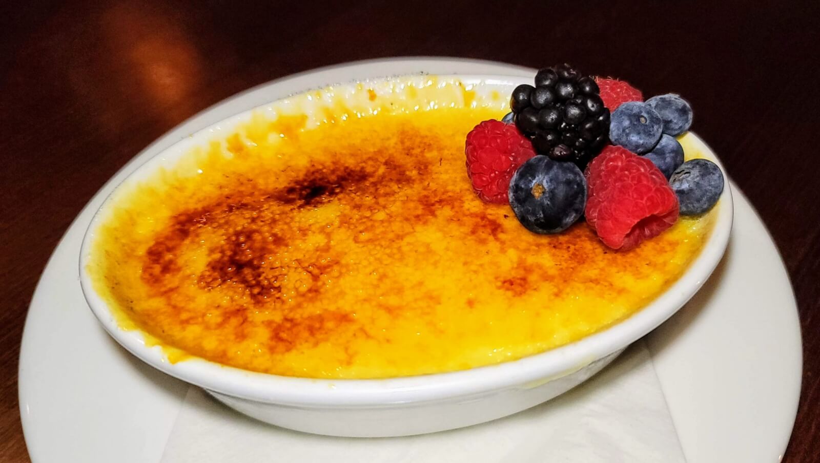 A bowl of crystalized Classic Creme Brulee at The Fort Steakhouse in Fort Pierce, Florida. 