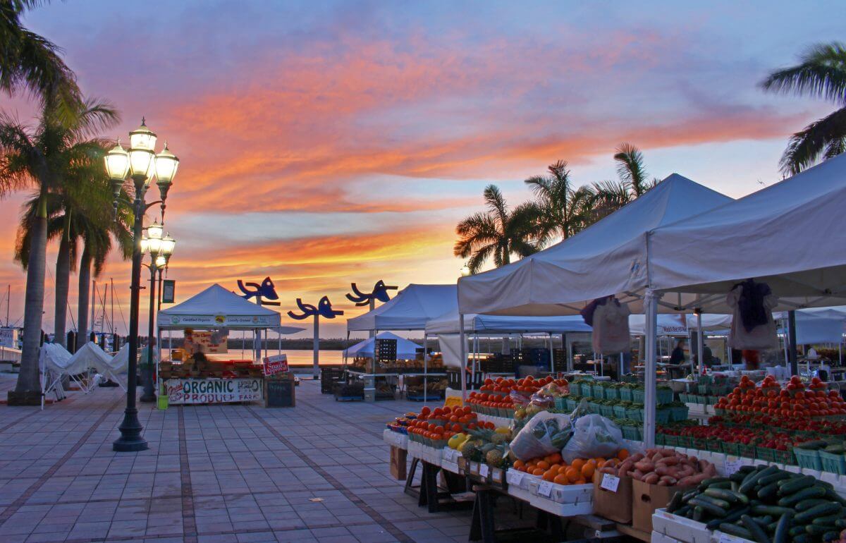 A waterside farmers market at sunset in St. Lucie, Florida.